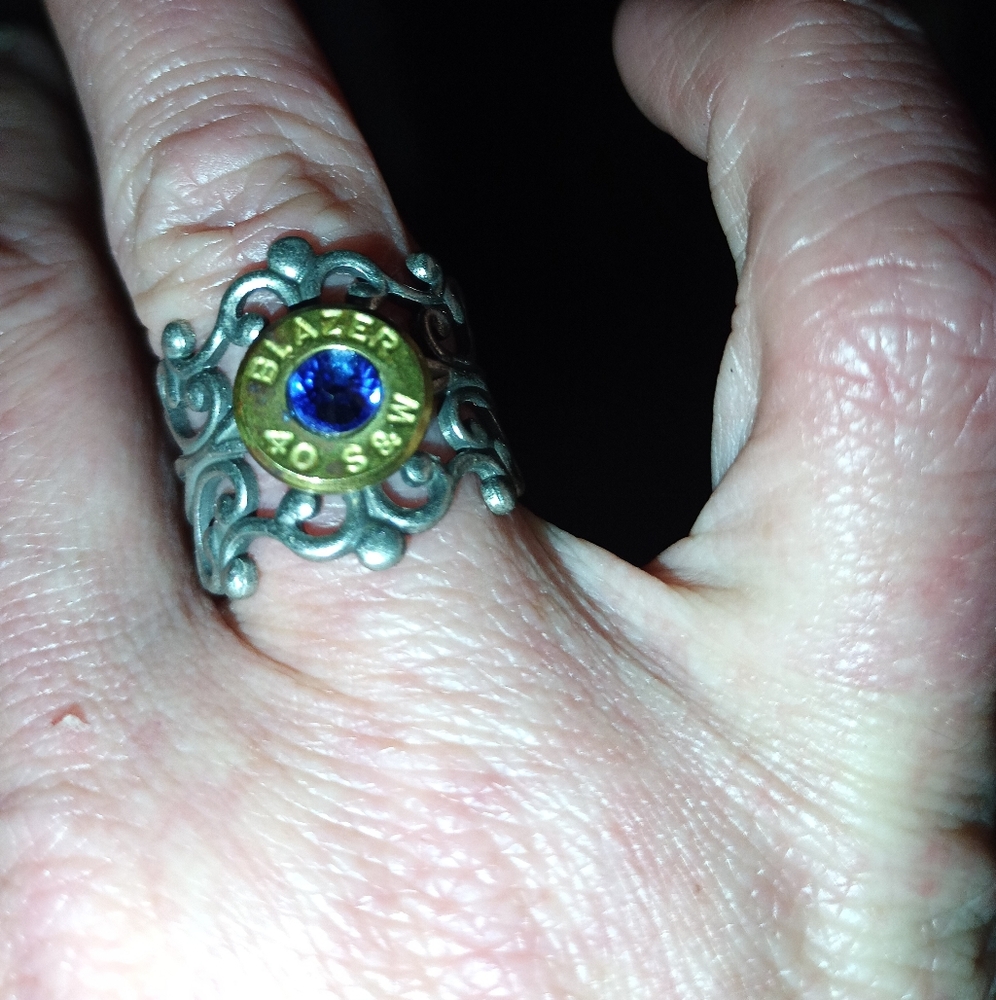 Elegant Silver and Gold Ring with Blue Gem